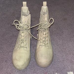 Tan colored combat boots